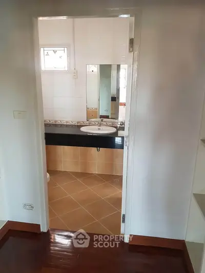 Charming bathroom with elegant tile flooring and modern sink design