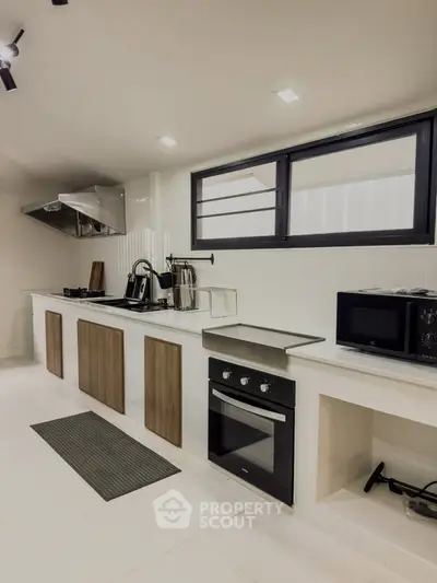 Modern kitchen with sleek appliances and open layout design