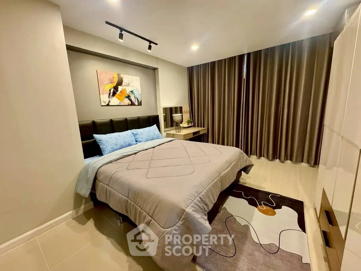 Modern bedroom with stylish decor and cozy ambiance