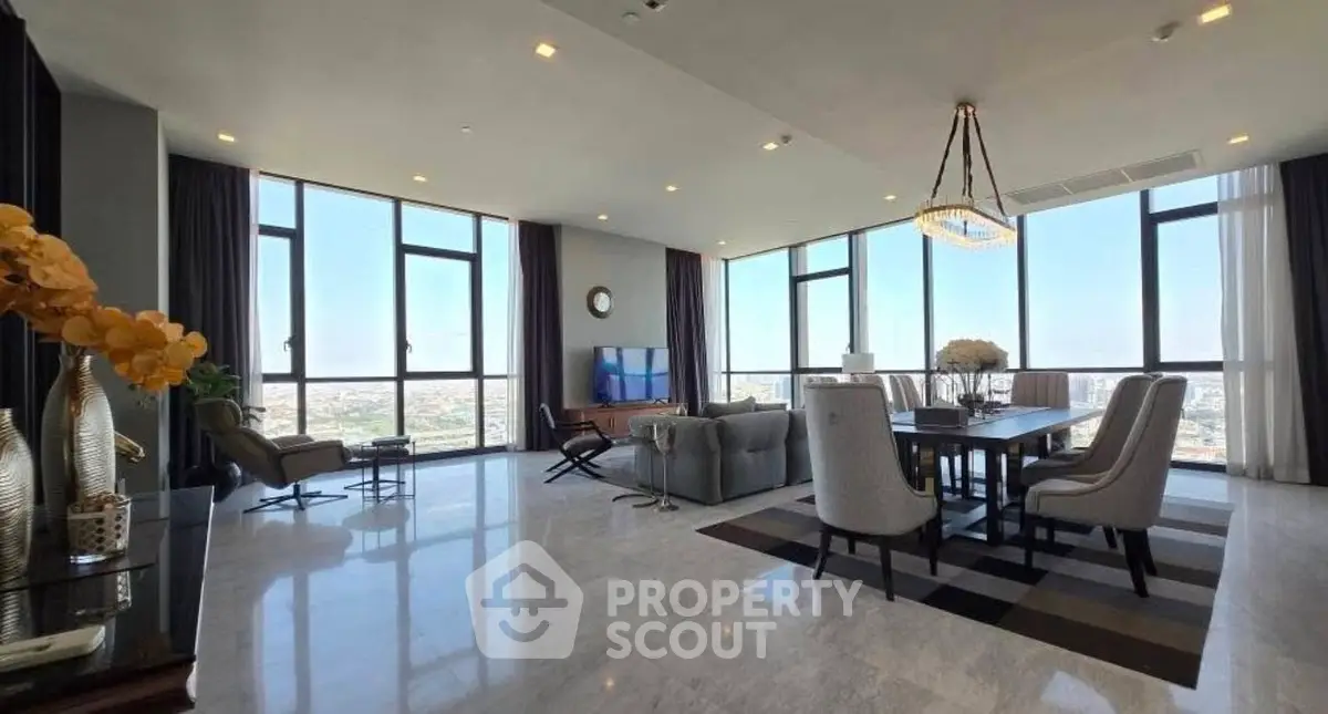 Luxurious high-rise living room with panoramic city views and elegant decor