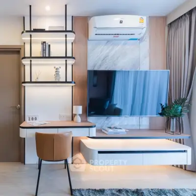 Modern living room with sleek design, wall-mounted TV, and stylish shelving.