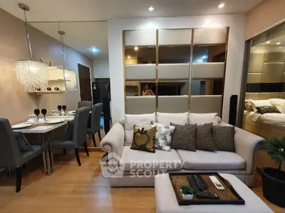 Stylish modern living room with elegant dining area and cozy sofa, perfect for urban living.