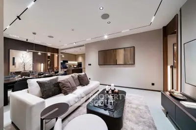 Luxurious modern living room with elegant decor and open layout, perfect for sophisticated urban living.