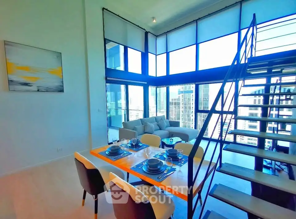 Stunning modern living room with high ceilings and city view, featuring a stylish dining area and staircase.