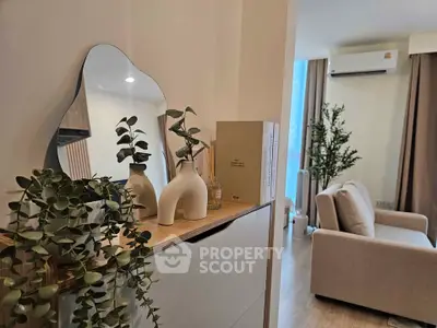 Stylish living room with modern decor and air conditioning