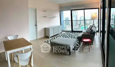 Spacious modern living room with city view and stylish decor