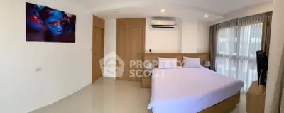 Modern bedroom with large windows and stylish decor