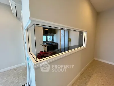 Modern kitchen with sleek design and open layout, featuring stainless steel appliances and stylish countertops.
