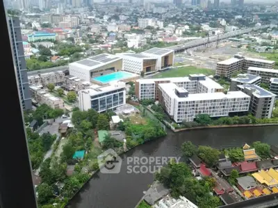 Stunning aerial view of modern buildings and river in vibrant cityscape