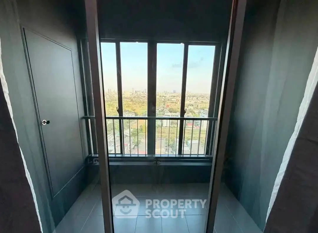 Stunning high-rise balcony with panoramic city view, perfect for urban living enthusiasts.