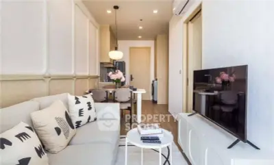 Modern living room with stylish decor and open kitchen layout