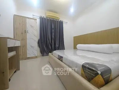 Modern bedroom with stylish decor and air conditioning