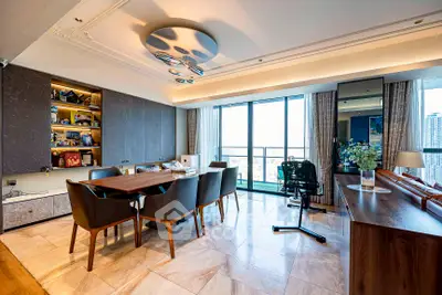 Spacious modern living room with elegant dining area and city view balcony.