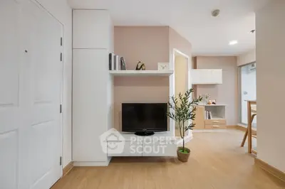 Modern living room with sleek TV unit and stylish decor