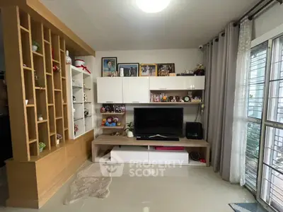 Modern living room with stylish shelving and entertainment center