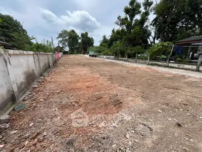 Vacant land plot ready for development in a serene neighborhood.