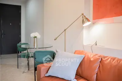Modern living room with stylish decor and cozy seating area.
