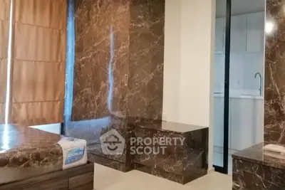 Luxurious bedroom with marble accents and modern design