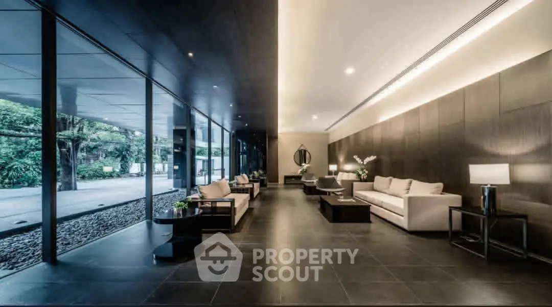 Luxurious modern lobby with sleek design and elegant furnishings, offering a sophisticated ambiance.