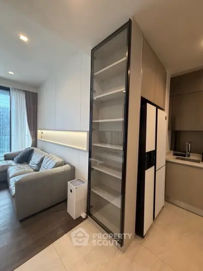 Modern apartment interior with sleek kitchen and cozy living room