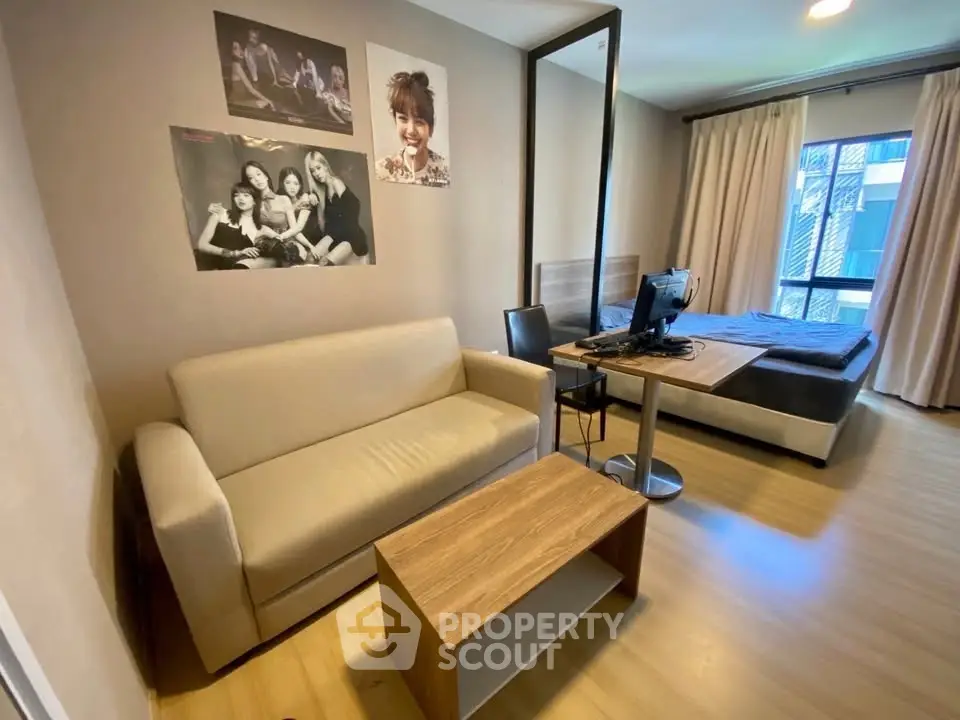 Modern studio apartment with cozy living area and stylish decor