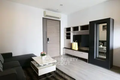 Modern living room with sleek furniture and air conditioning