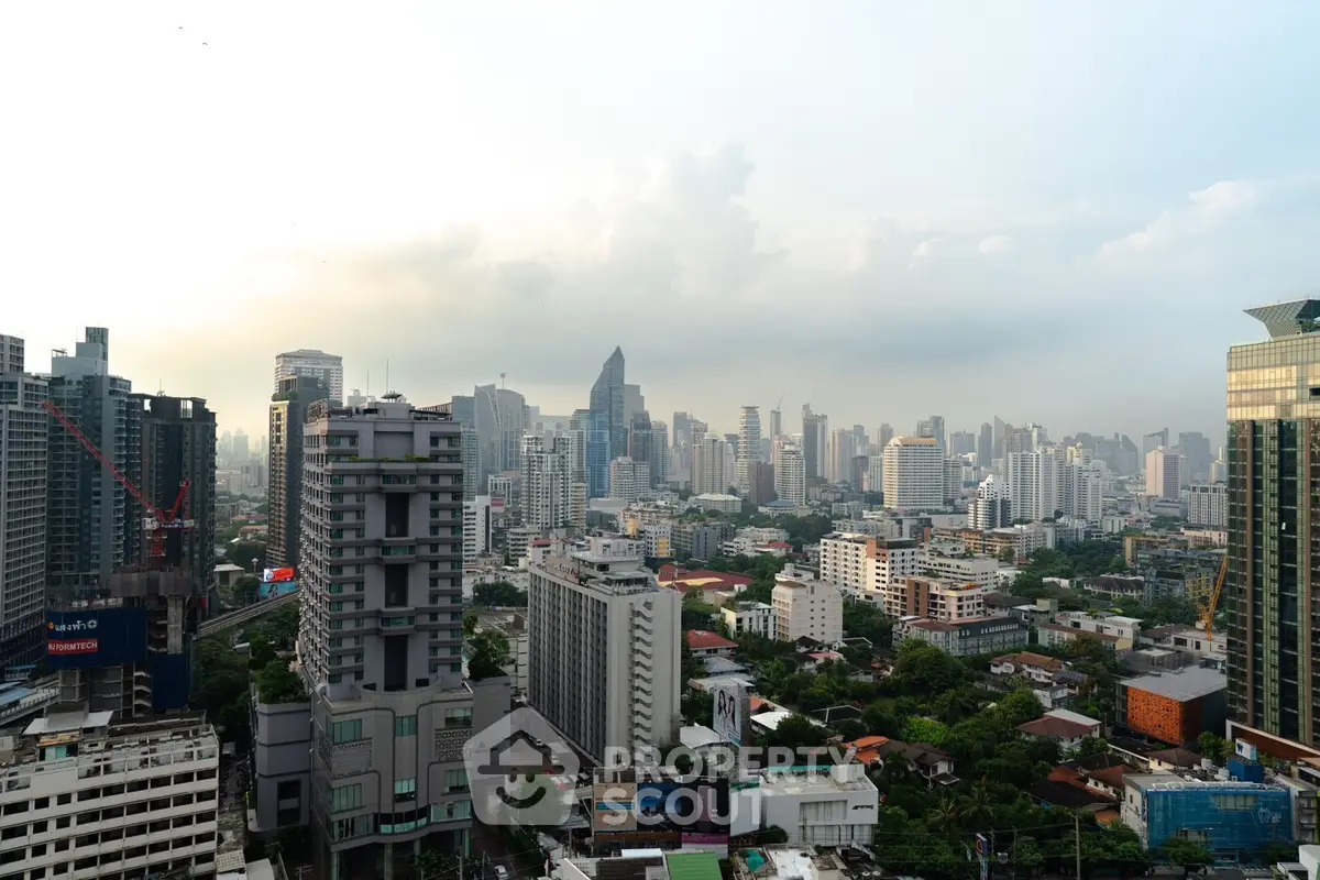 Stunning cityscape view showcasing modern skyscrapers and lush greenery, perfect for urban living enthusiasts.