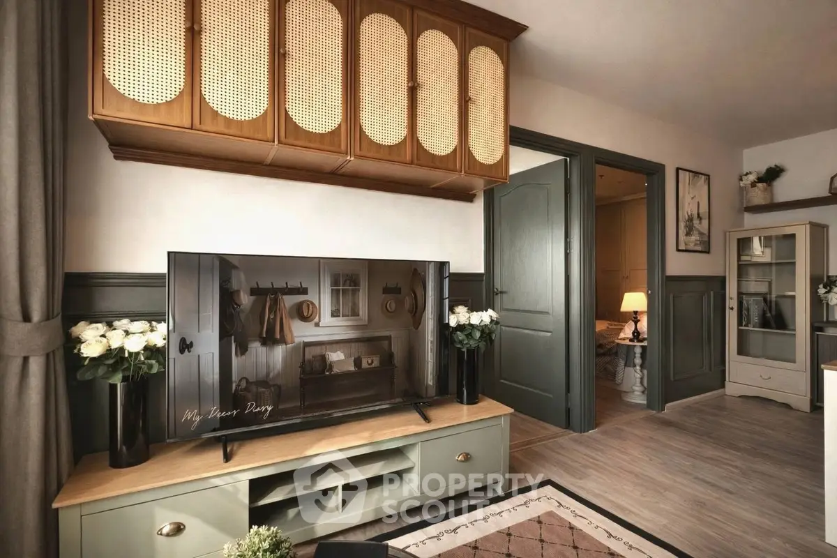 Charming living room with stylish decor and modern TV setup