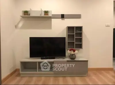 Modern living room with sleek TV stand and minimalist decor