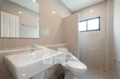Modern bathroom with sleek fixtures and natural light