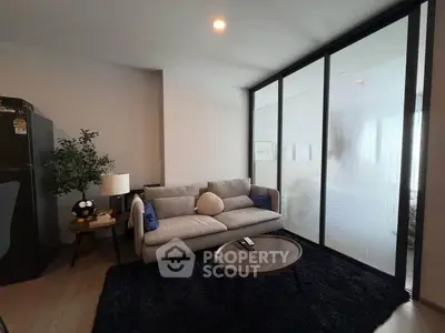 Modern living room with cozy sofa and stylish decor