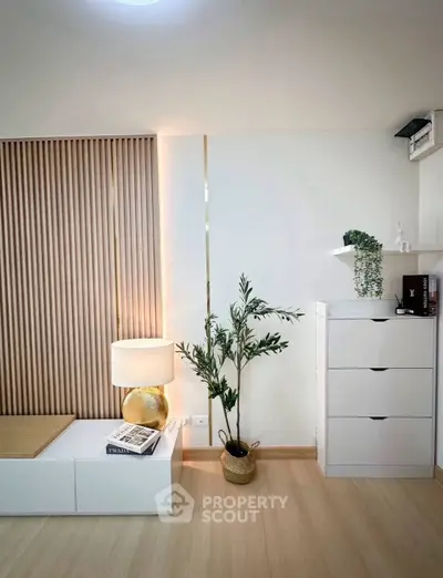 Modern minimalist living room with stylish decor and wooden accents