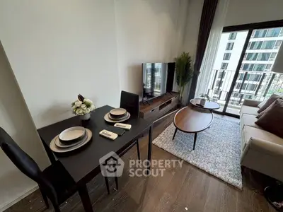 Modern living room with balcony view in high-rise apartment