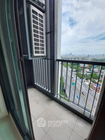 Charming balcony with city view, perfect for relaxation and enjoying the skyline.