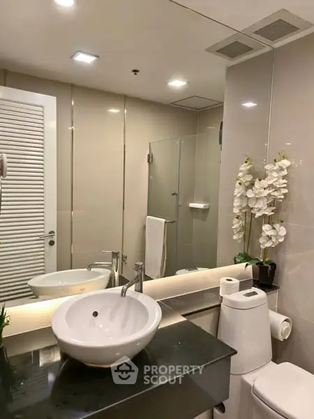 Modern bathroom with sleek fixtures and elegant decor