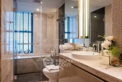 Luxurious modern bathroom with elegant fixtures and natural light