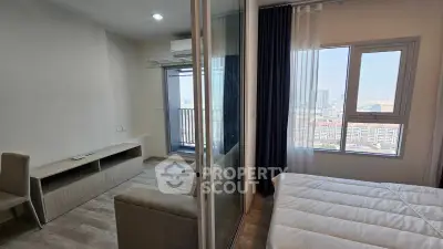 Modern apartment with glass partition and city view from balcony