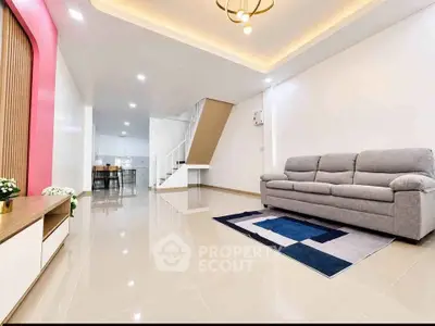 Spacious modern living room with elegant decor and open layout