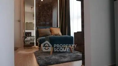 Cozy modern living room with stylish armchair and elegant decor