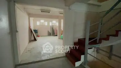 Spacious unfinished basement with potential for customization in a residential property.