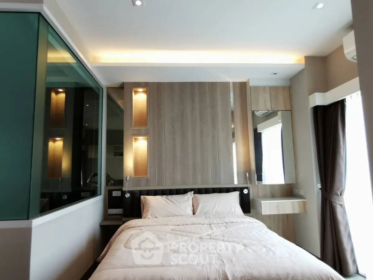 Modern bedroom with elegant lighting and stylish decor