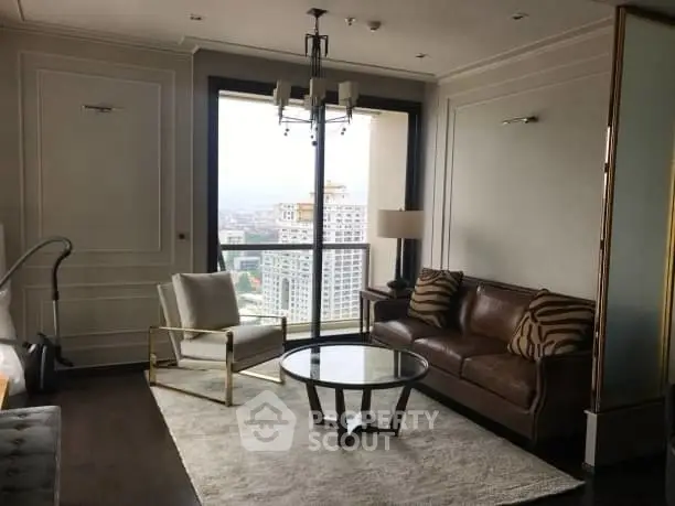 Elegant living room with city view, featuring modern furniture and large windows.