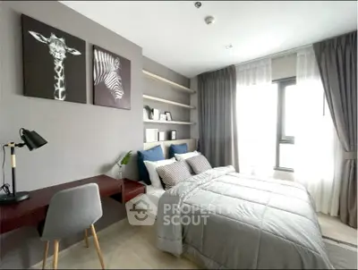 Modern bedroom with stylish decor and natural light, featuring a cozy bed and workspace.