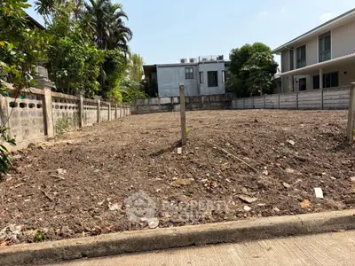 Vacant land plot in a residential area, ideal for building a custom home.