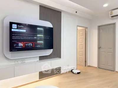 Modern living room with wall-mounted TV and sleek design