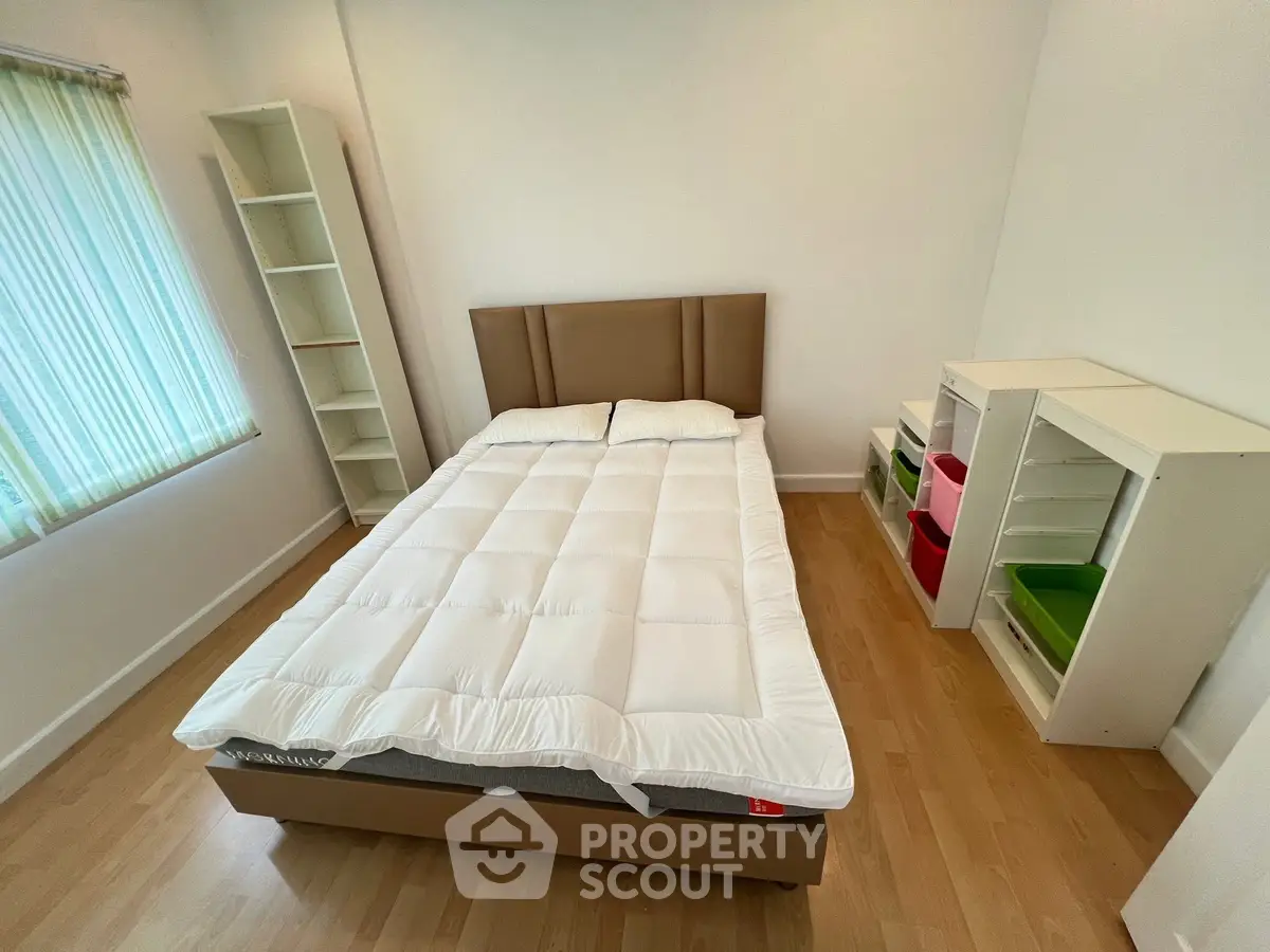Cozy bedroom with modern furniture and natural light