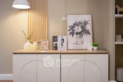 Stylish modern interior with elegant decor and soft lighting, perfect for a cozy living space.