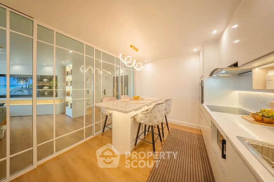 Luxurious modern kitchen with sleek design and elegant lighting