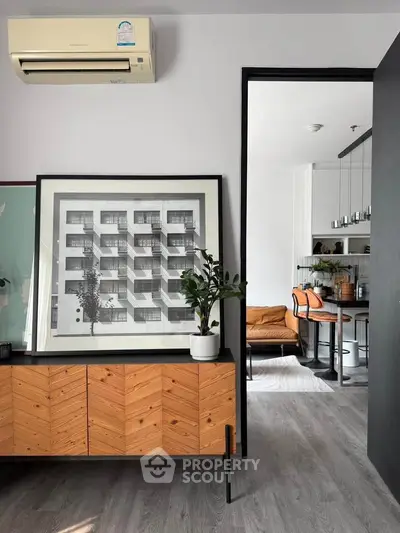 Stylish modern apartment interior with chic decor and open layout, featuring elegant furniture and contemporary artwork.