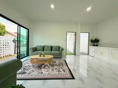 Spacious modern living room with elegant decor and natural light